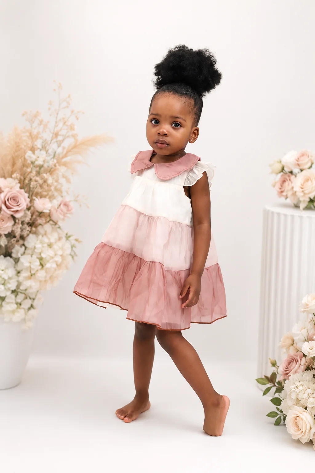 Young child portrait in a garden setting